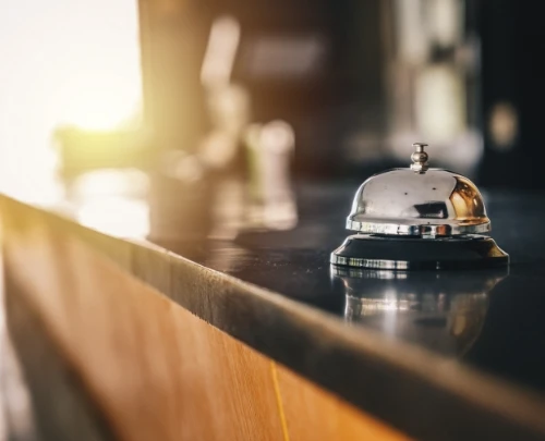 bell at reception counter